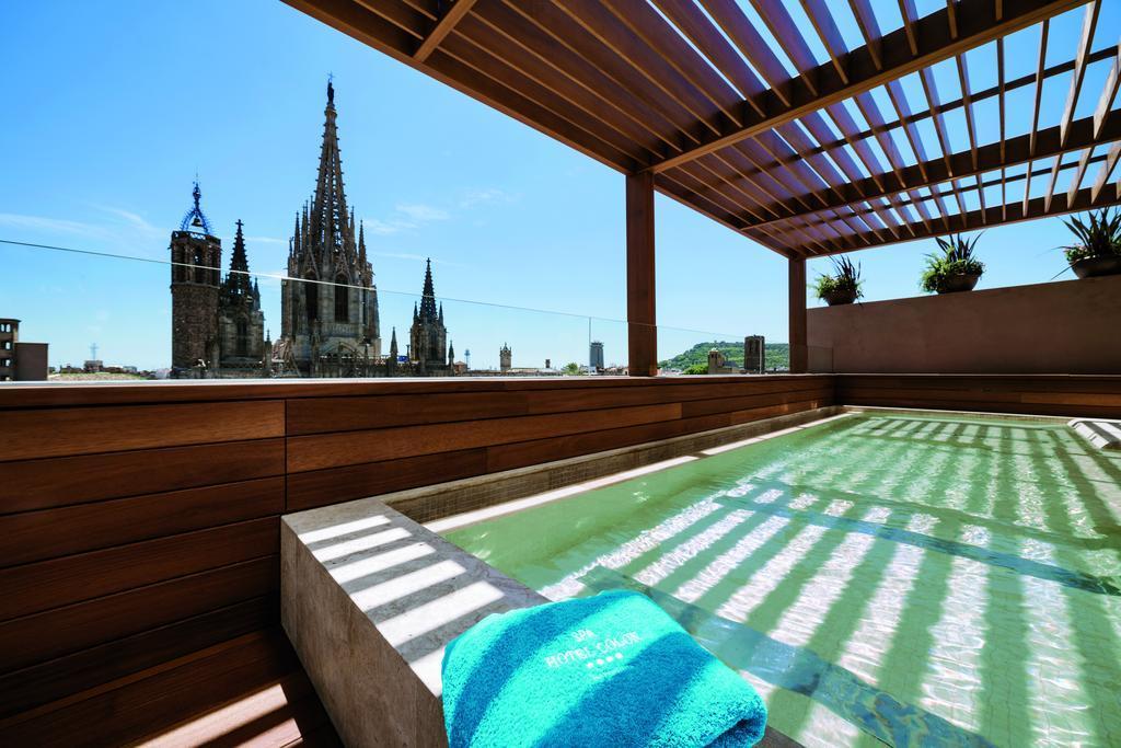 Colón Hotel Barcelona Exterior foto Rooftop pool